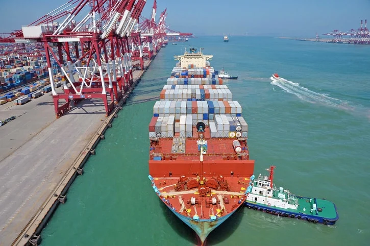 Vessel berthing at the Port of Qingdao, China container terminal.
